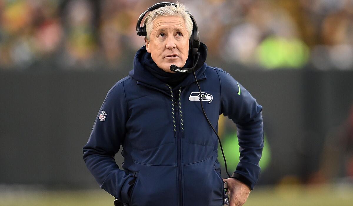 Seattle Seahawks Coach Pete Carroll watches the action during his team's loss to the Packers at Green Bay on Dec. 11.