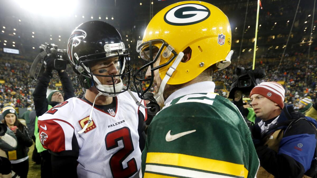 The NFC championship game will feature a potential MVP in Atlanta's Matt Ryan (2) and a former one in Green Bay's Aaron Rodgers.