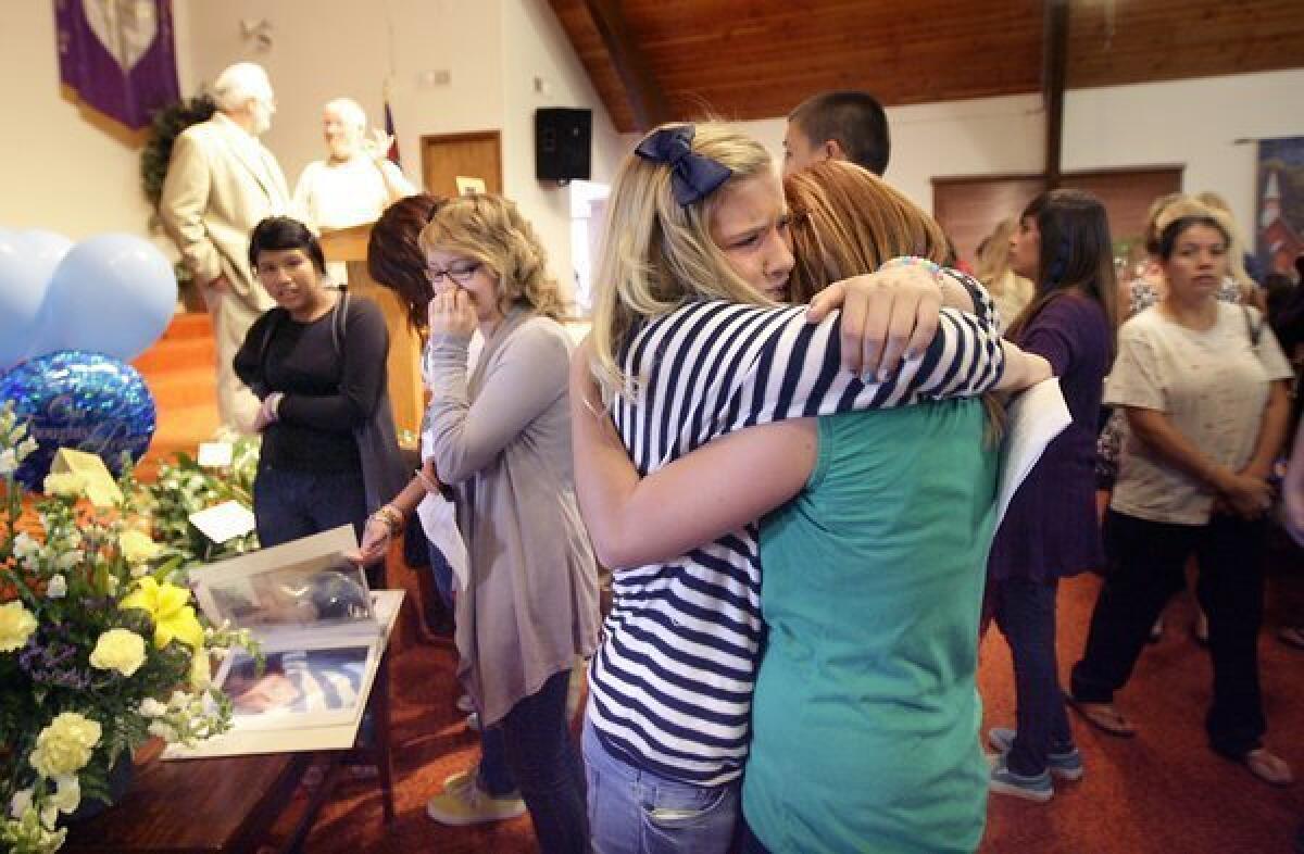 A 2011 study by the Gay, Lesbian & Straight Education Network found that 81.9% of lesbian, gay, bisexual or transgender students reported being verbally harassed, 38.3% reported being physically harassed and 18.3% reported being physically assaulted at school in the previous year because of their sexual orientation. Above: In Tehachapi, Calif., friends hug at Seth Walsh's memorial after he committed suicide. Police determined the gay teen was bullied for at least two years.