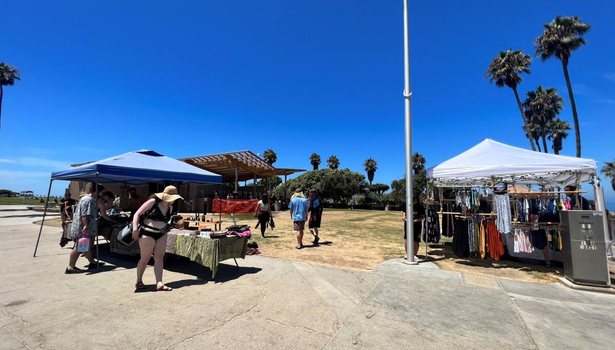 Vendors are pictured at Scripps Park in La Jolla before enforcement of San Diego's restrictions took effect in February. 