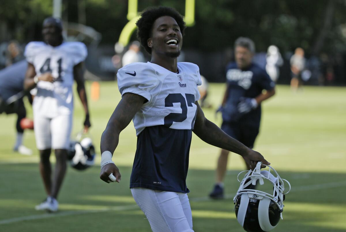 Rams cornerback Donte' Deayon smiles during a joint training camp session on Aug. 8.