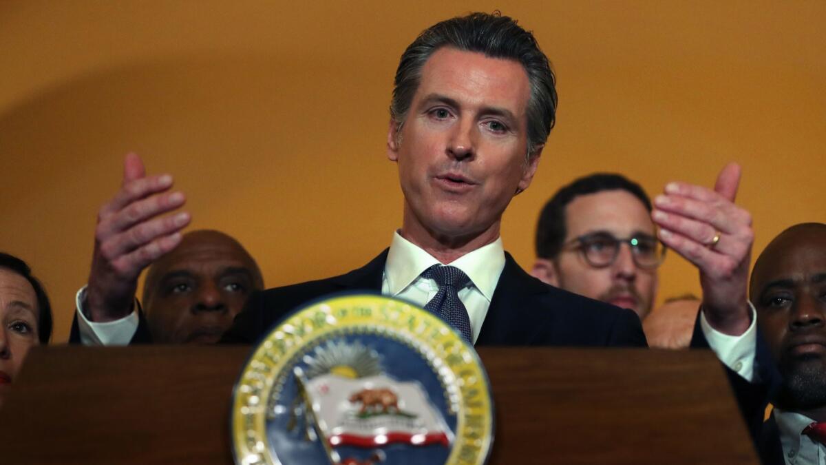 Gov. Gavin Newsom at a news conference Wednesday announcing a moratorium on California's death penalty.