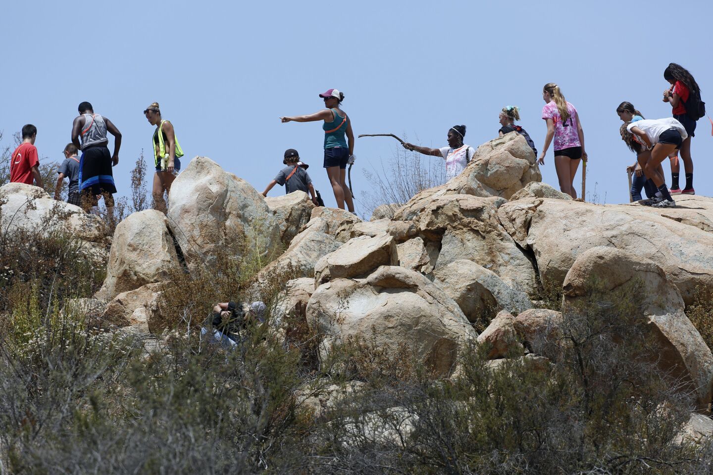 Volunteers search rural areas of Menifee on Tuesday for Terry Dewayne Smith.