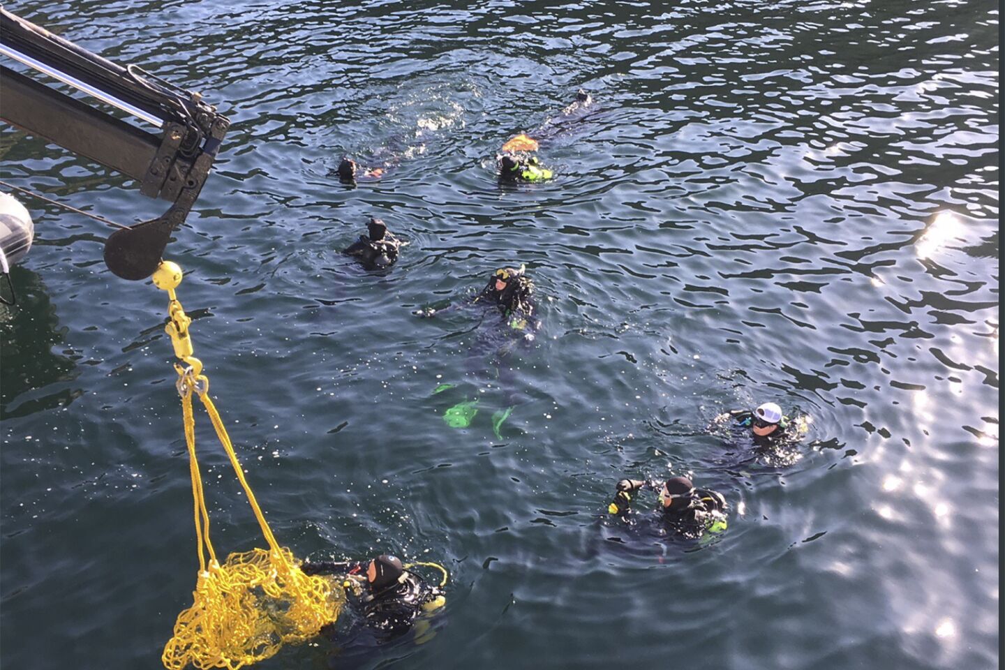 Divers and support crews from many agencies work the scene of the dive boat fire off Santa Cruz Island.