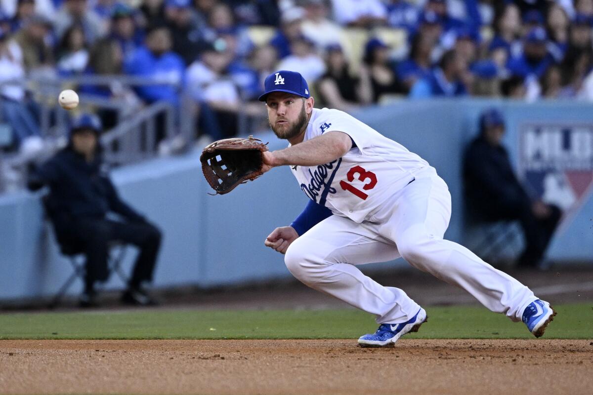 Max Muncy suffered two errors in the season's first five games at third base. (AP Photo/Mark J. Terrill)