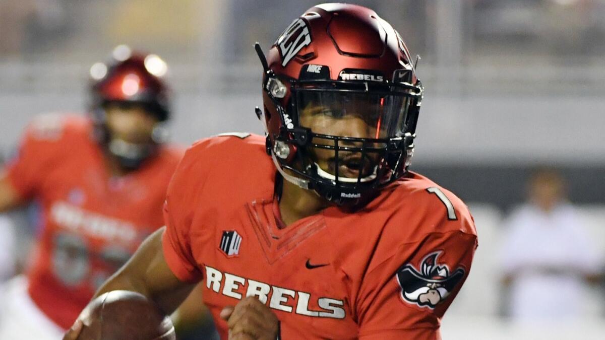 Nevada Las Vegas quarterback Armani Rogers rushed for 780 yards at a clip of 5.3 yards per carry and eight touchdowns last season.