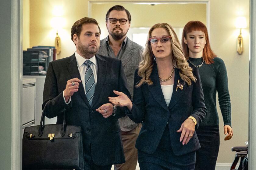 DON'T LOOK UP (L to R) JONAH HILL as JASON ORLEAN, LEONARDO DICAPRIO as DR. RANDALL MINDY, MERYL STREEP as PRESIDENT JANIE ORLEAN, JENNIFER LAWRENCE as KATE DIBIASKY in DON'T LOOK UP.. Cr. NIKO TAVERNISE/NETFLIX ? 2021