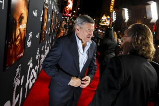 Ted Sarandos, chief executive officer (CEO) of Netflix, left, with Bob Gazalle, president and CEO of American Film Institute