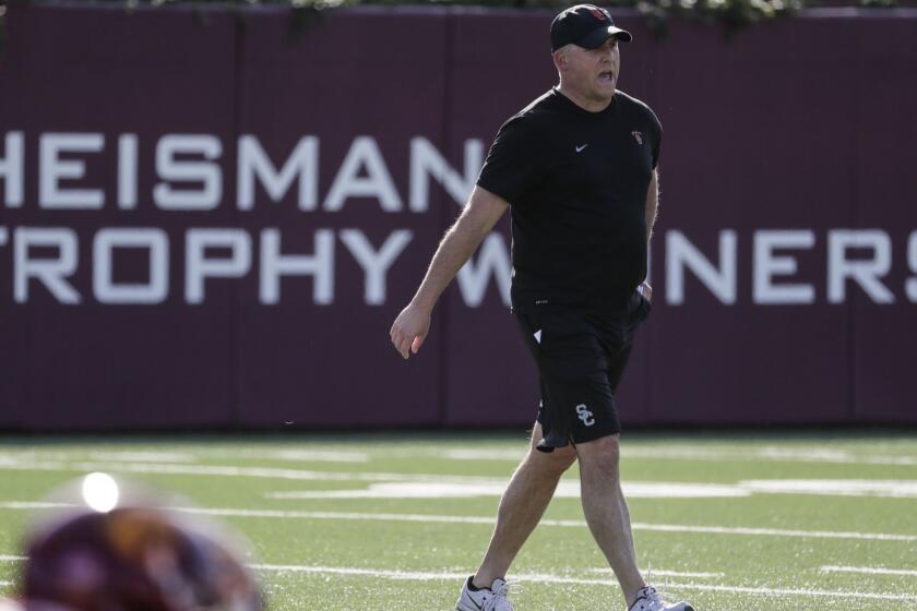 LOS ANGELES, CA, TUESDAY, MARCH 6, 2018 - USC head coach Clay Helton leads a spring practice at Howard Jones Field. (Robert Gauthier/Los Angeles Times)