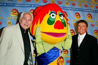 Marty Krofft, H.R. Pufnstuf and Sid Krofft (Photo by Donato Sardella/WireImage/Getty Images)