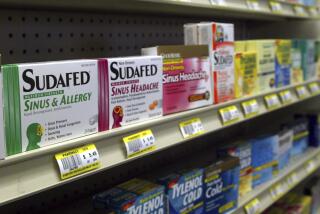 FILE - Sudafed and other common nasal decongestants containing pseudoephedrine are on display behind the counter at Hospital Discount Pharmacy in Edmond, Okla., Jan. 11, 2005. The leading decongestant used by millions of Americans looking for relief from a stuffy nose is likely no better than a dummy pill, according to government experts who reviewed the latest research on the long-questioned drug ingredient. Advisers to the Food and Drug Administration voted unanimously on Tuesday, Sept. 12, 2023 against the effectiveness of the ingredient found in popular versions of Sudafed, Allegra, Dayquil and other medications sold on pharmacy shelves. (AP Photo, File)