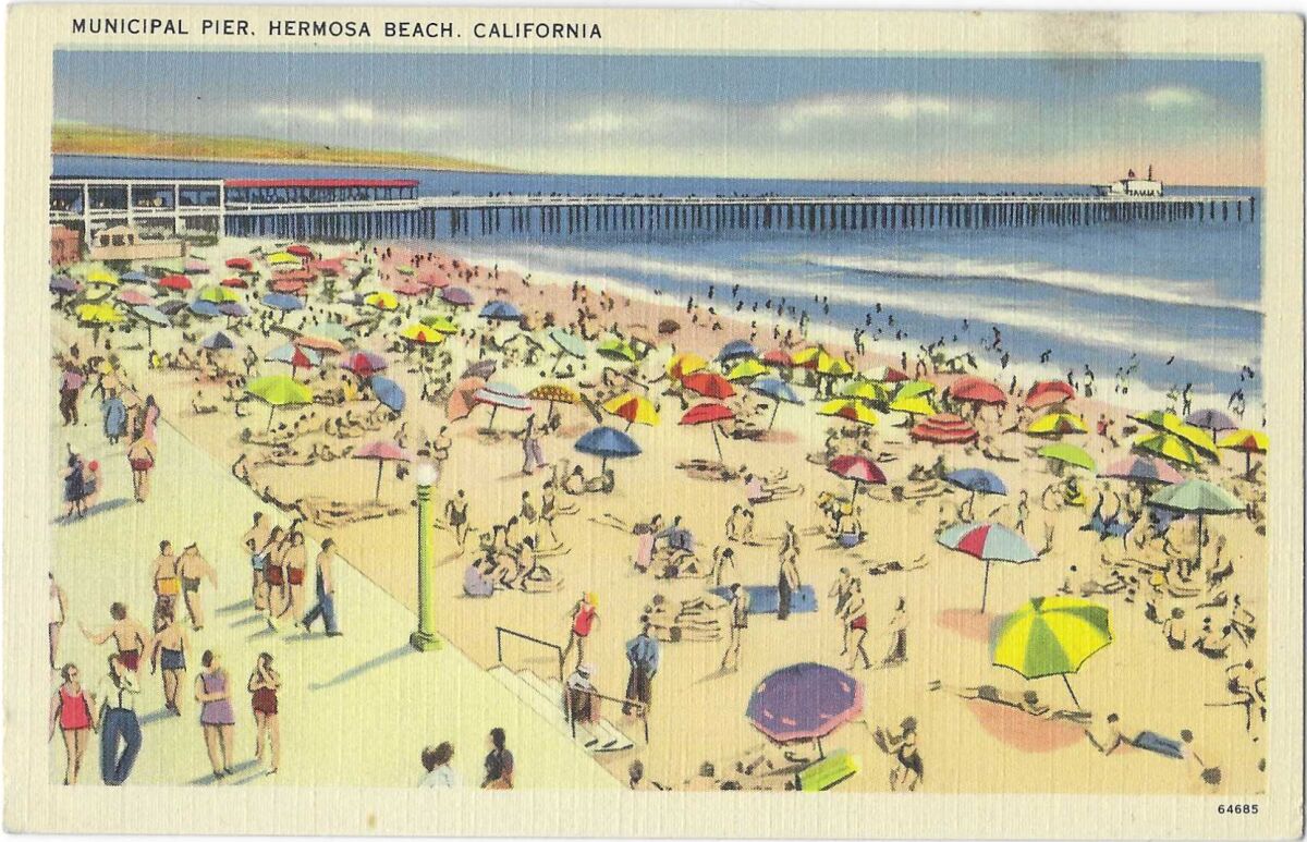 An illustration of a crowded beach area, with sunbathers on the sand beneath umbrellas and a pier in the background.