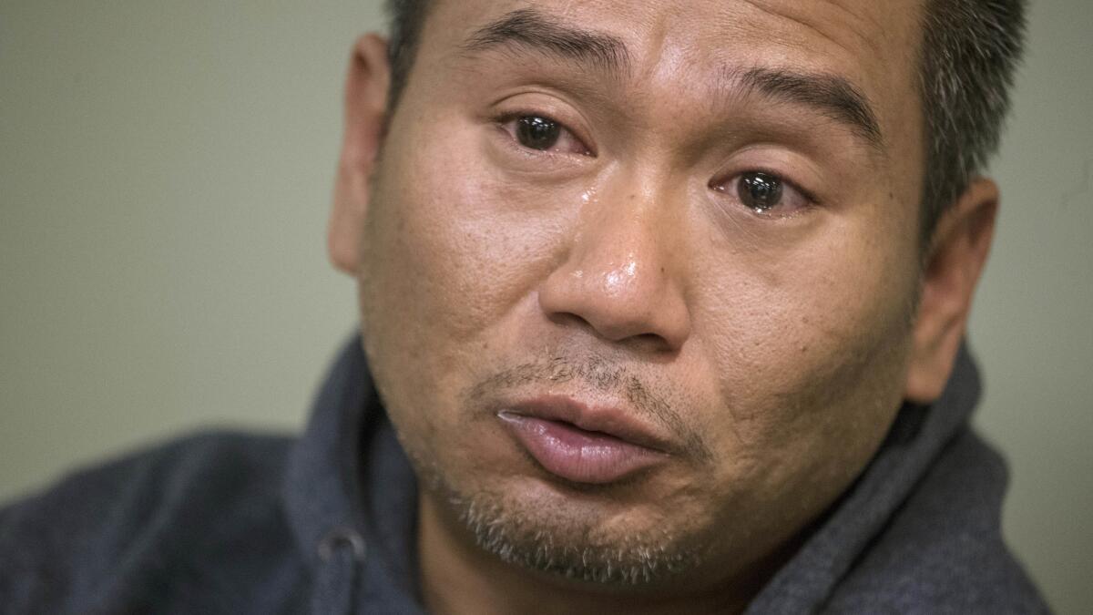 Tears roll down the face of Cambodian refugee Posda Tuot as he talks about his cousin, Nak Kim "Rickie" Chhoeun.
