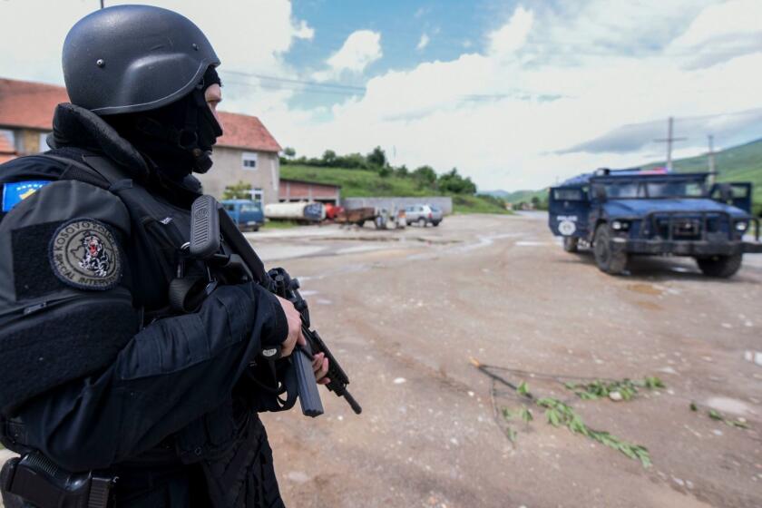 Mandatory Credit: Photo by STRINGER/EPA-EFE/REX (10252624d) Kosovo's police special unit secure the area near the village of Cabra, northern Kosovo, 28 May 2019. Two police officers were wounded as local Serbs resisted the major anti-smuggling operation, where dozens people were arrested in Serb dominated northern part of the country. Kosovo police major anti-smuggling operation, Cabra, Serbia - 28 May 2019 ** Usable by LA, CT and MoD ONLY **