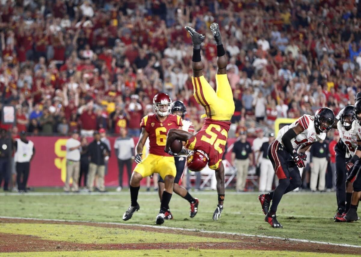 USC running back Ronald Jones II flips into the end zone for the go-ahead score in the fourth quarter of the Trojans' 28-27 victory over Utah at the Coliseum.