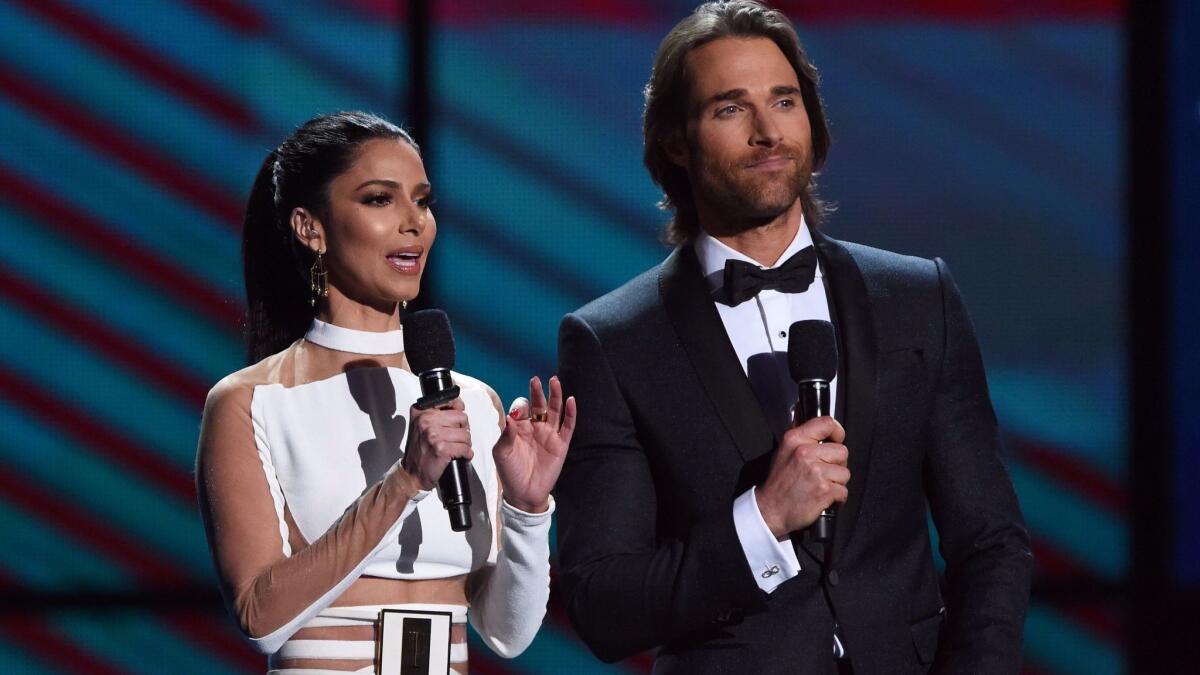 Hosts Roselyn Sanchez and Sebastian Rulli at the 17th Latin Grammy Awards.