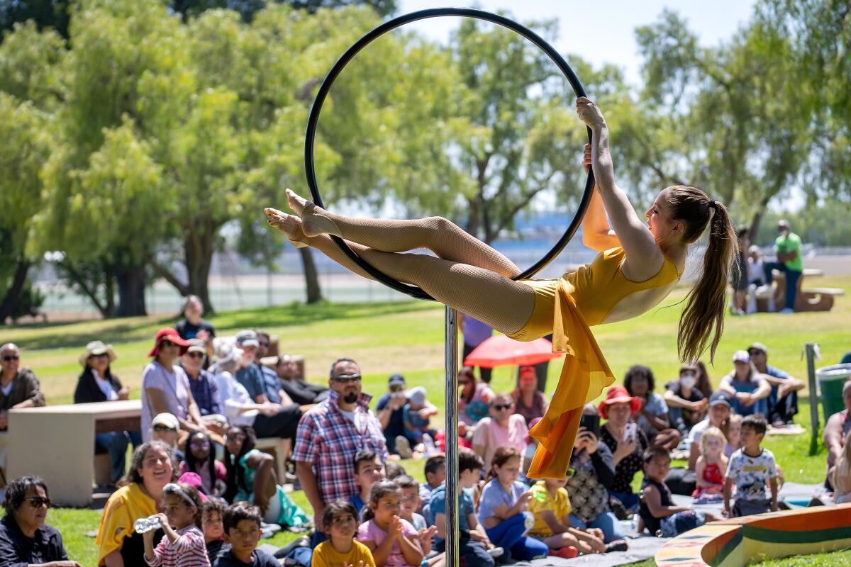 A lollipop aerialist at a past Fern Street Circus show in San Diego.