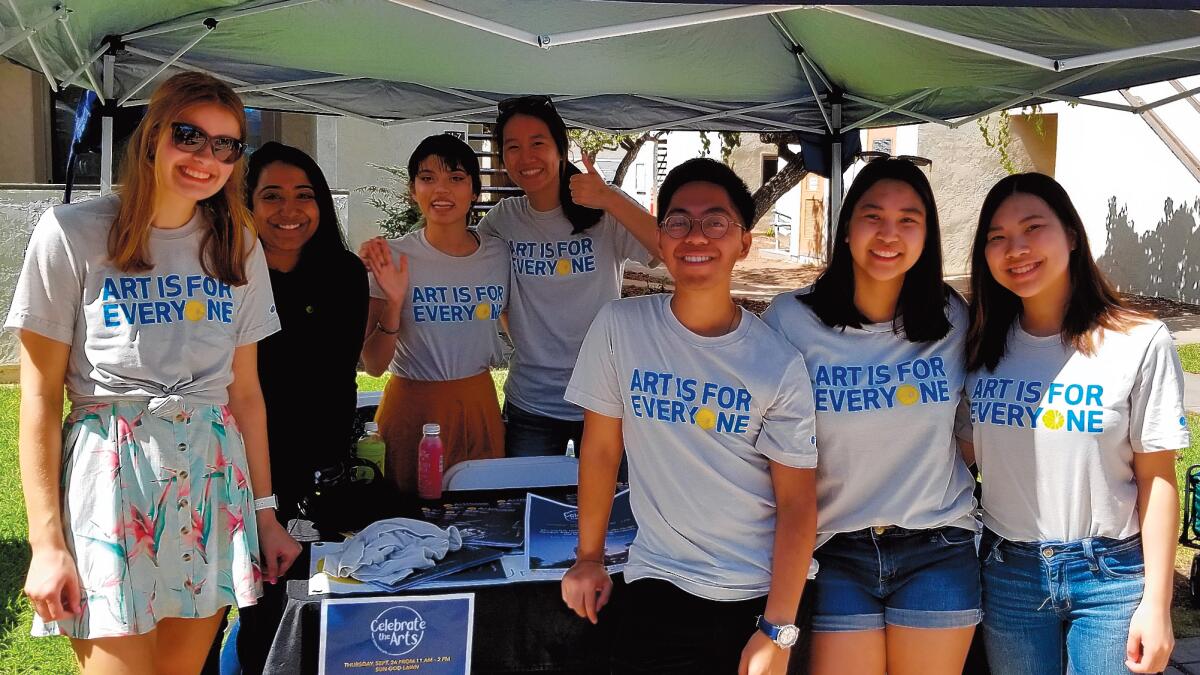 The ArtPower Student Marketing Team promotes the arts at a UC San Diego event.