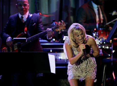 Carrie Underwood performs during the annual industry buzz event/party hosted by music-biz veteran Clive Davis.