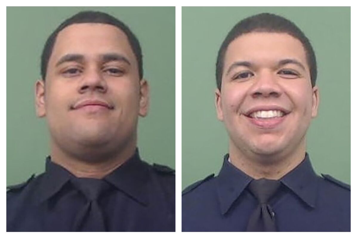 NYPD Officers Wilbert Mora, left, and Jason Rivera 