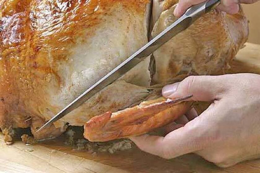 1. Start with the wings: Hold the knife at the joint at a 45-degree angle to the wing and slice through the joint.