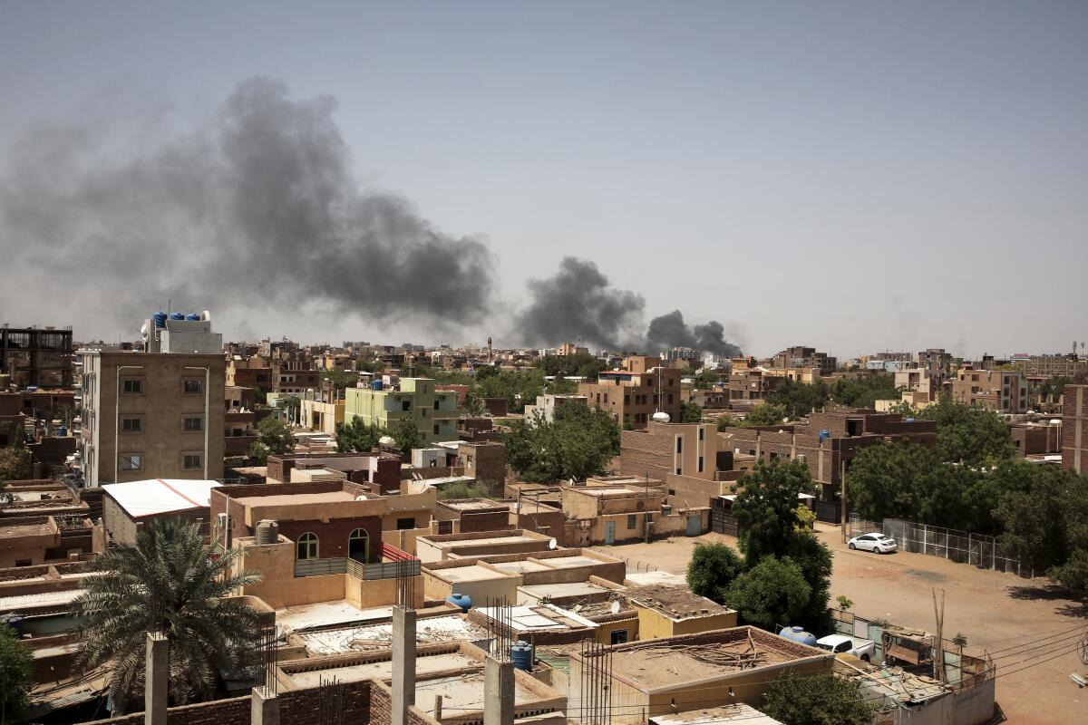 Smoke rises above Khartoum, Sudan.