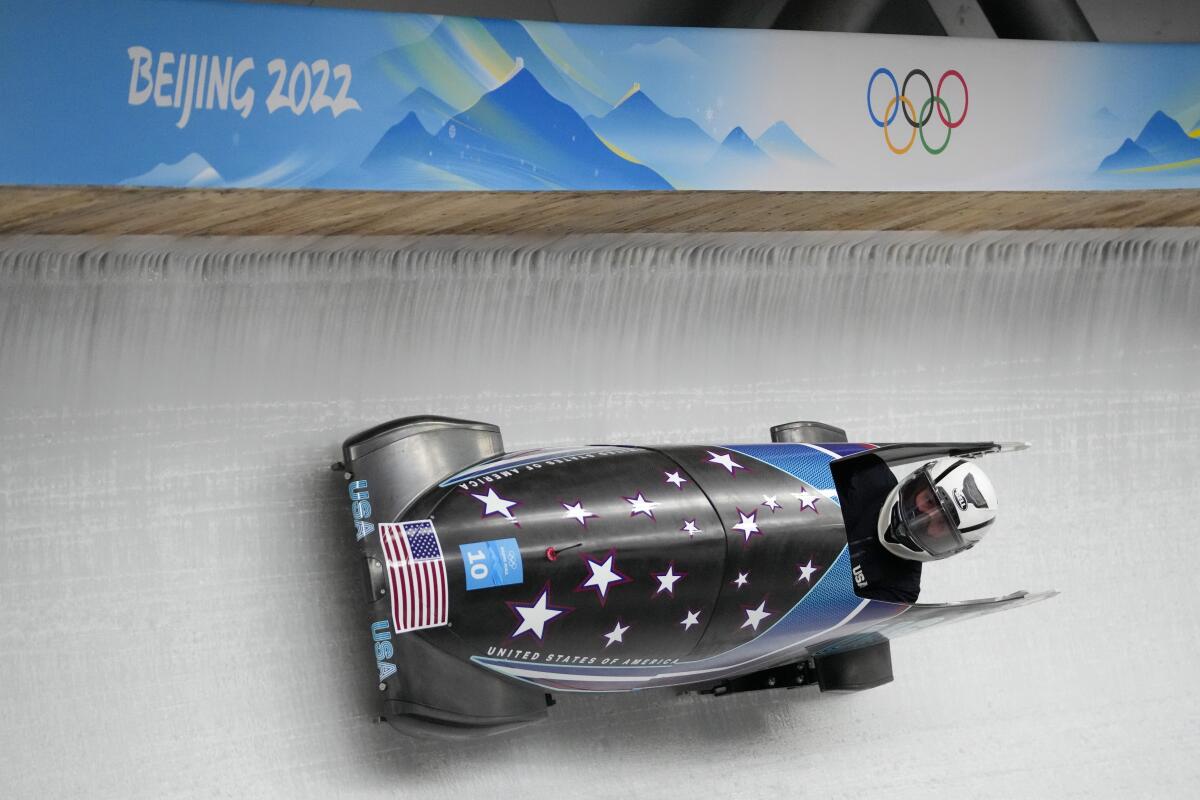 Elana Meyers Taylor takes part in a monobob training heat Thursday at the 2022 Winter Olympics.