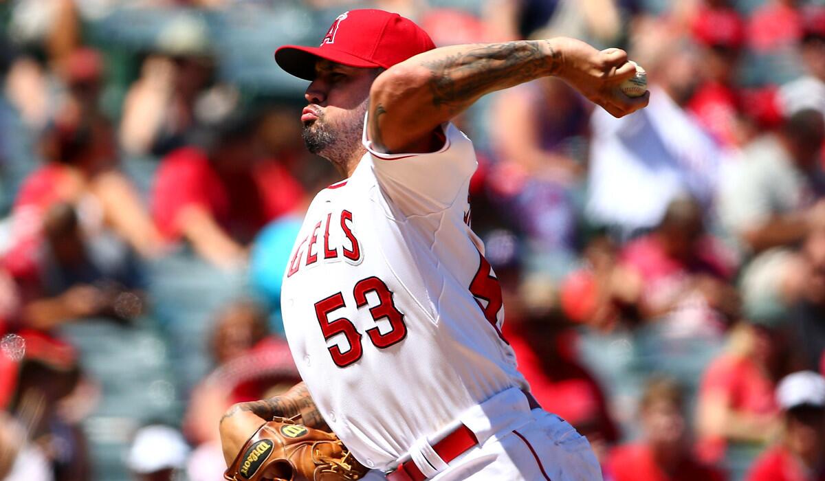 Angels pitcher Hector Santiago pitches against the Texas Rangers at Angel Stadium on Sunday.