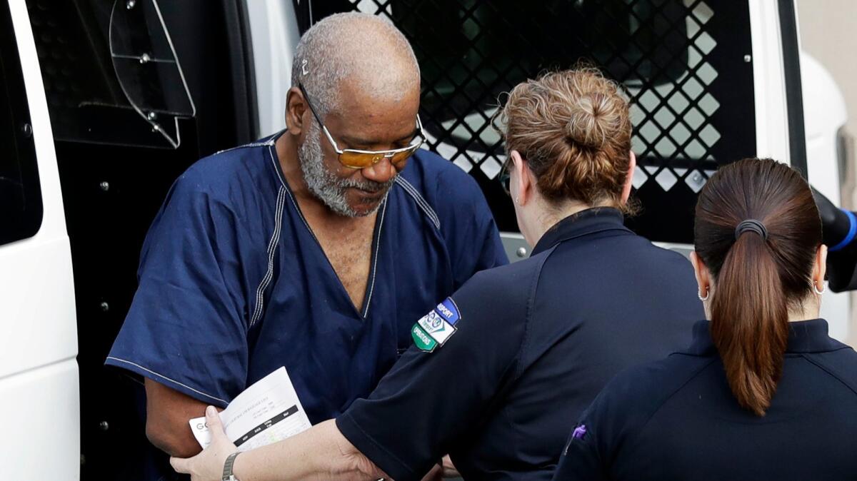 James Matthew Bradley Jr. arrives at a courthouse for a hearing in connection with the deaths of people packed into a broiling tractor-trailer.