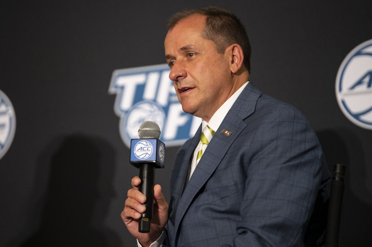 Atlantic Coast Conference Commissioner Jim Phillips speaks during NCAA college basketball ACC media day, Tuesday, Oct. 12, 2021, in Charlotte, N.C. (AP Photo/Matt Kelley)