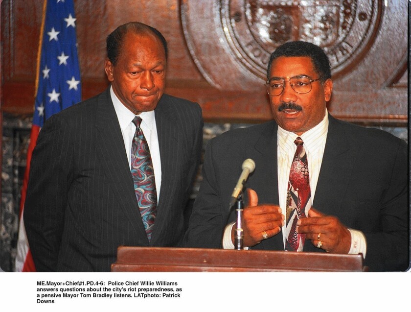 Willie Williams, right, who had headed the Philadelphia Police Department, was named LAPD chief by Mayor Tom Bradley after the 1992 riots.