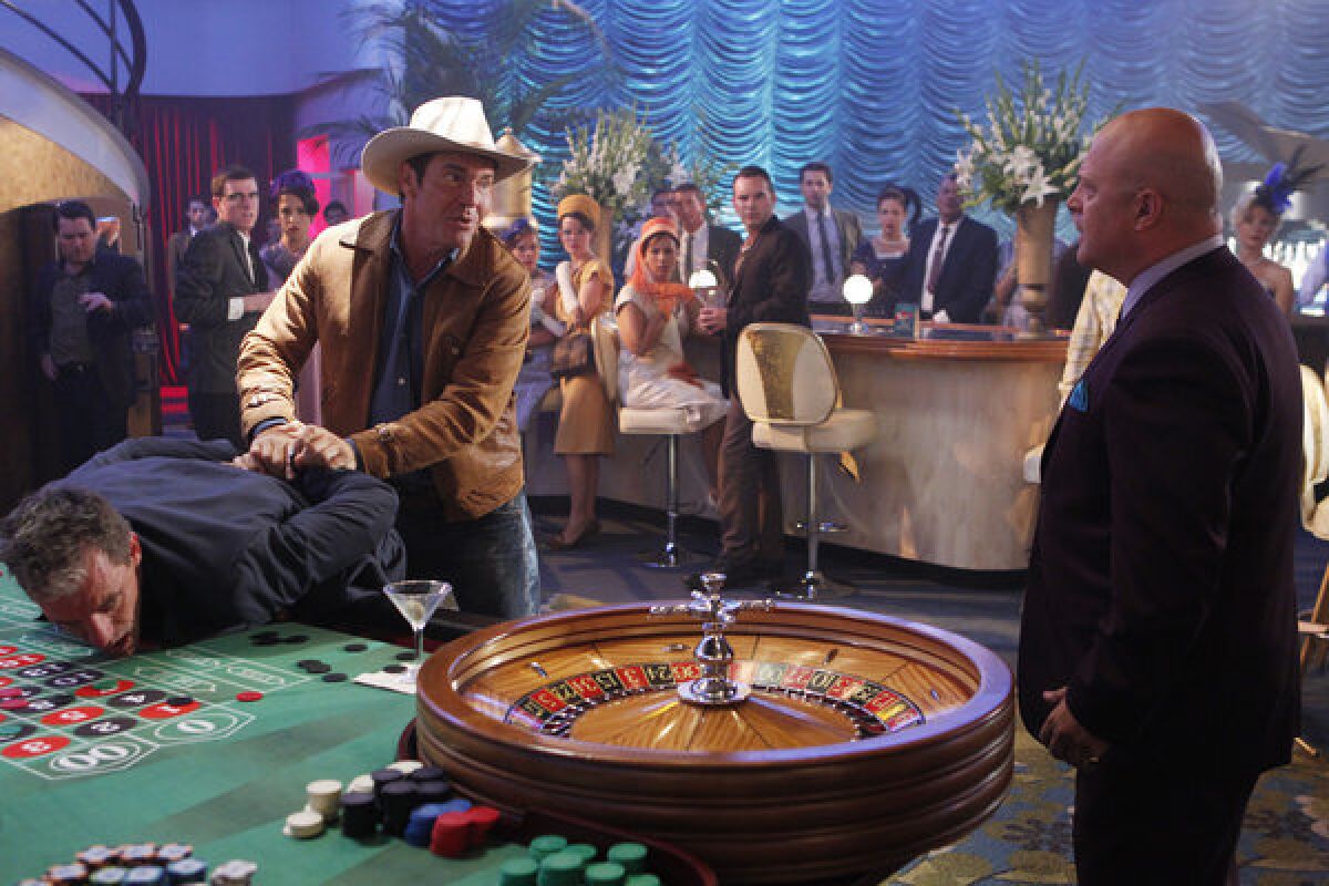 Dennis Quaid, left, and Michael Chiklis in a scene from "Vegas," which will move to Friday nights.