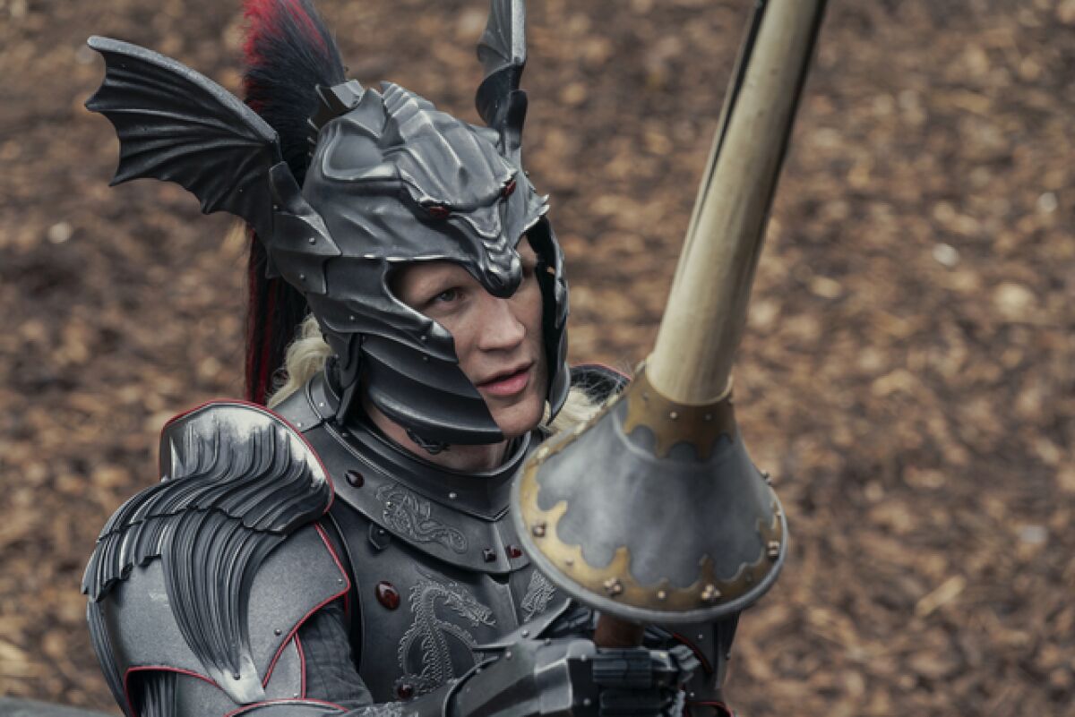 A man in a suit of armor holds a lance in "House of the Dragon."