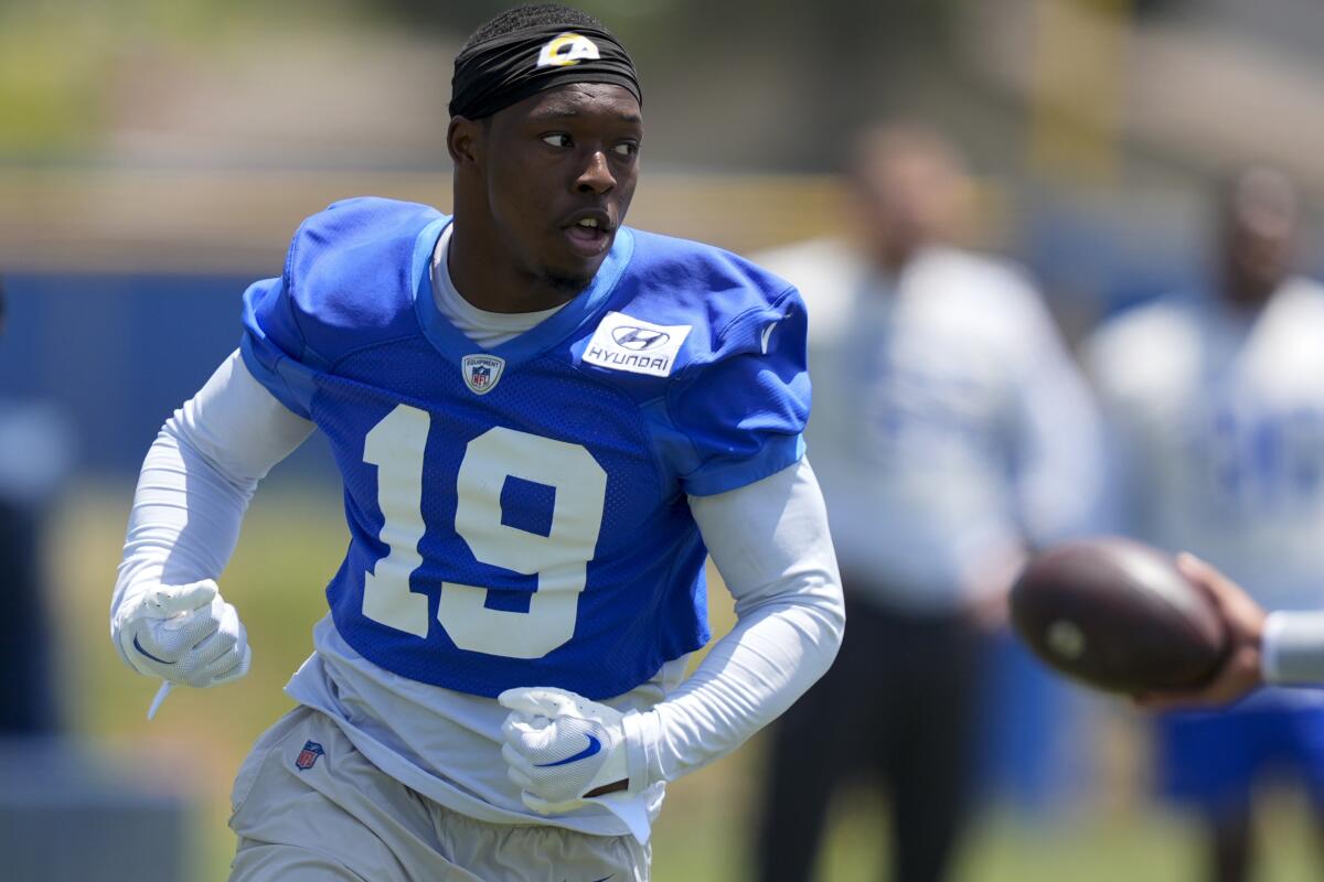 Rams wide receiver Xavier Smith runs drills during practice in May.