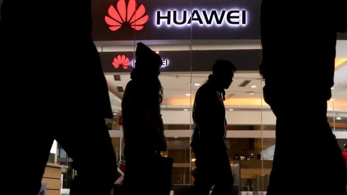 A Huawei retail shop in Beijing. The arrest of the company's chief executive officer, Meng Wanzhou, has put the spotlight on a tech giant that is little known in the United States.