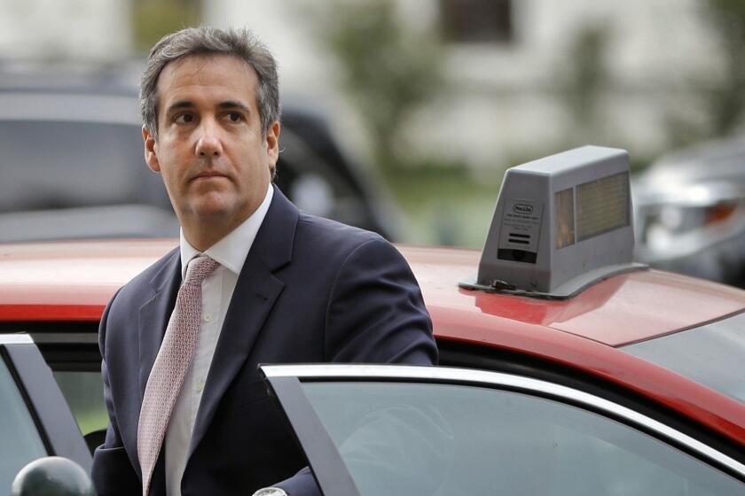 FILE - In this Sept. 19, 2017, file photo, Michael Cohen, President Donald Trump's personal attorney, steps out of a cab during his arrival on Capitol Hill in Washington. Cohen is shaking up his defense team ahead of his highly anticipated congressional testimony next month. His legal team announced Monday, Jan. 28, 2019, that two attorneys from Chicago will represent Cohen as he continues to cooperate with special counsel Robert Mueller. (AP Photo/Pablo Martinez Monsivais, File)