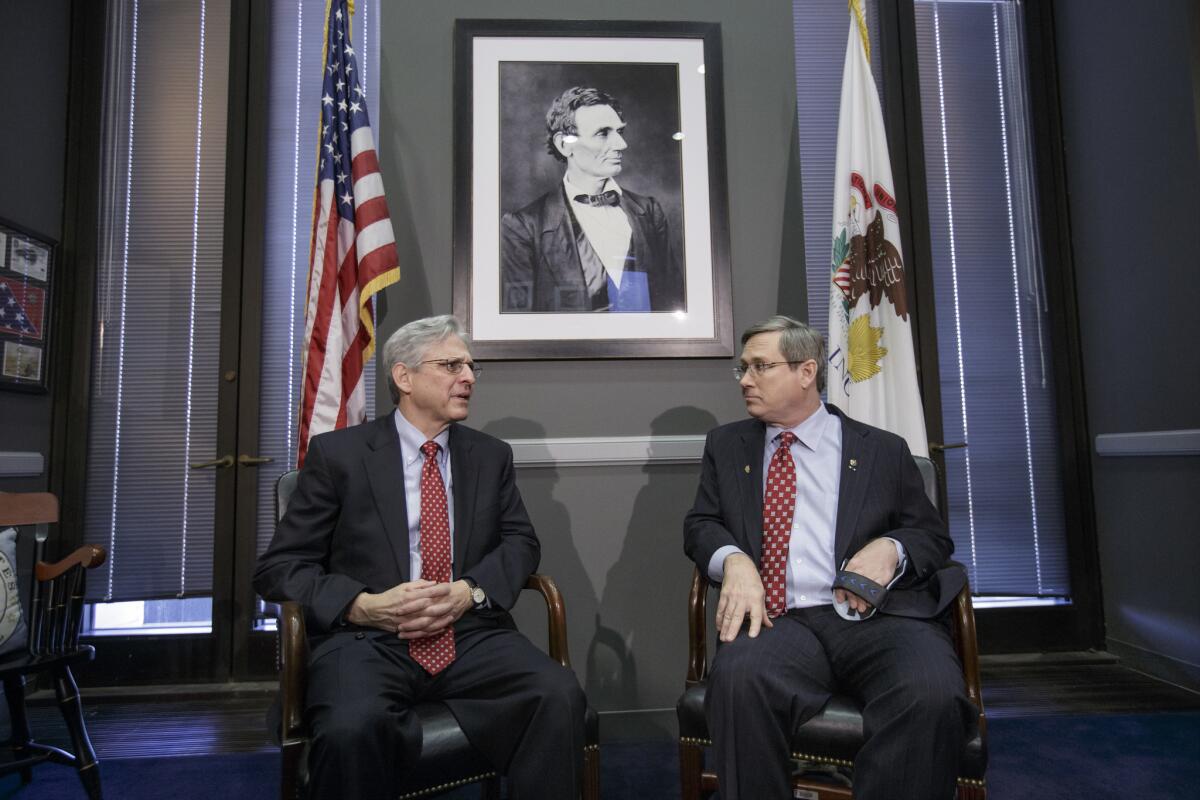 Sen. Mark Kirk (R-Ill.), right, meets in his office on Capitol Hill with Judge Merrick Garland, President Obama’s choice for the Supreme Court.