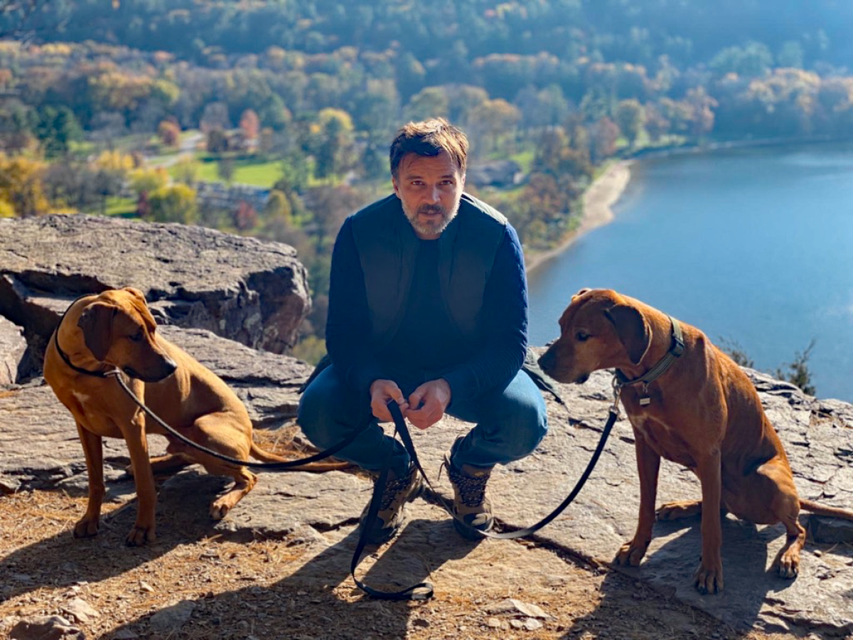 U.S. men's national team coach Anthony Hudson and his two Rhodesian Ridgebacks, Dyer and Junior.