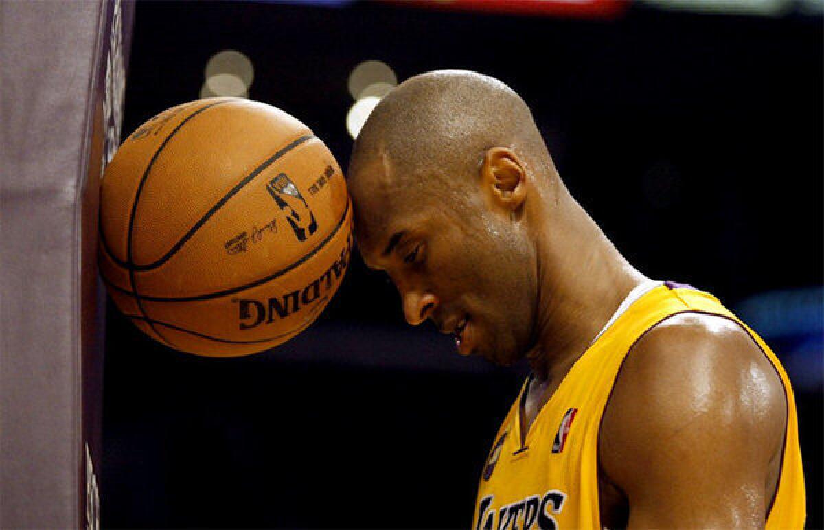 Lakers guard Kobe Bryant vents frustration during a game against the Toronto Raptors.