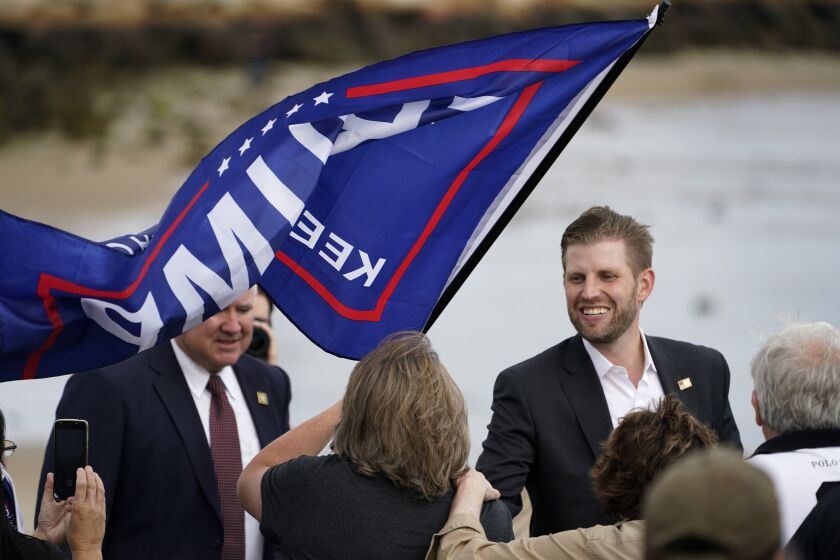Eric Trump, the son of President Donald Trump, greets supporters at a campaign rally, Tuesday, Sept. 17, 2020, in Saco, Maine. (AP Photo/Robert F. Bukaty)