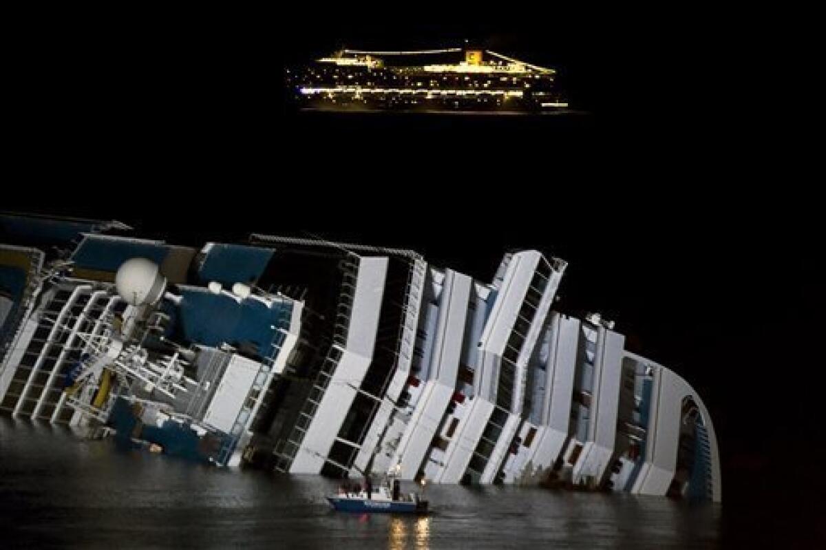 cruise ship sinking at night