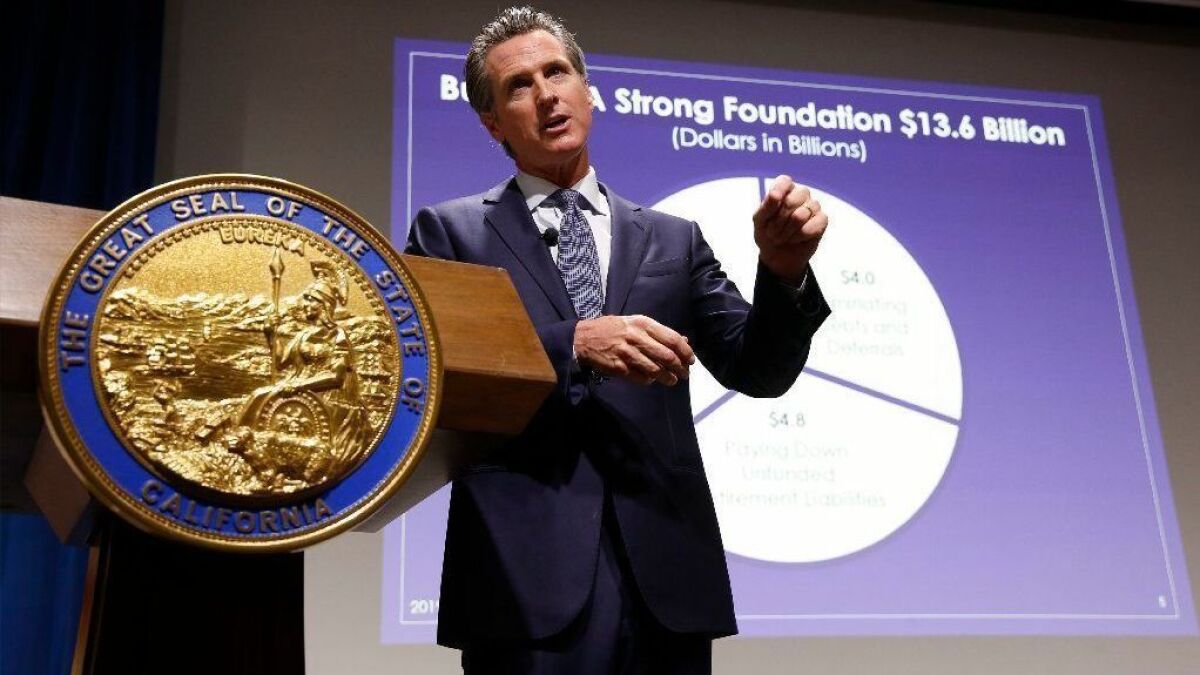 Gov. Gavin Newsom presents his first state budget during a news conference on Jan. 10 in Sacramento.
