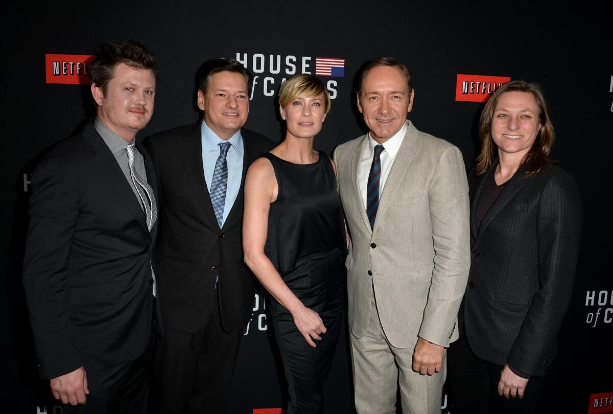 Consumers Union wants federal regulators to take a closer look at a deal struck between Comcast Corp. and Netflix to improve the video quality of shows, such as "House of Cards," streamed to Netflix subscribers. Above, from left, writer Beau Willimon, Netflix chief content officer Ted Sarandos, Robin Wright, Kevin Spacey and Netflix vice president for original series Cindy Holland post for a photo at a "House of Cards" screening in Los Angeles.