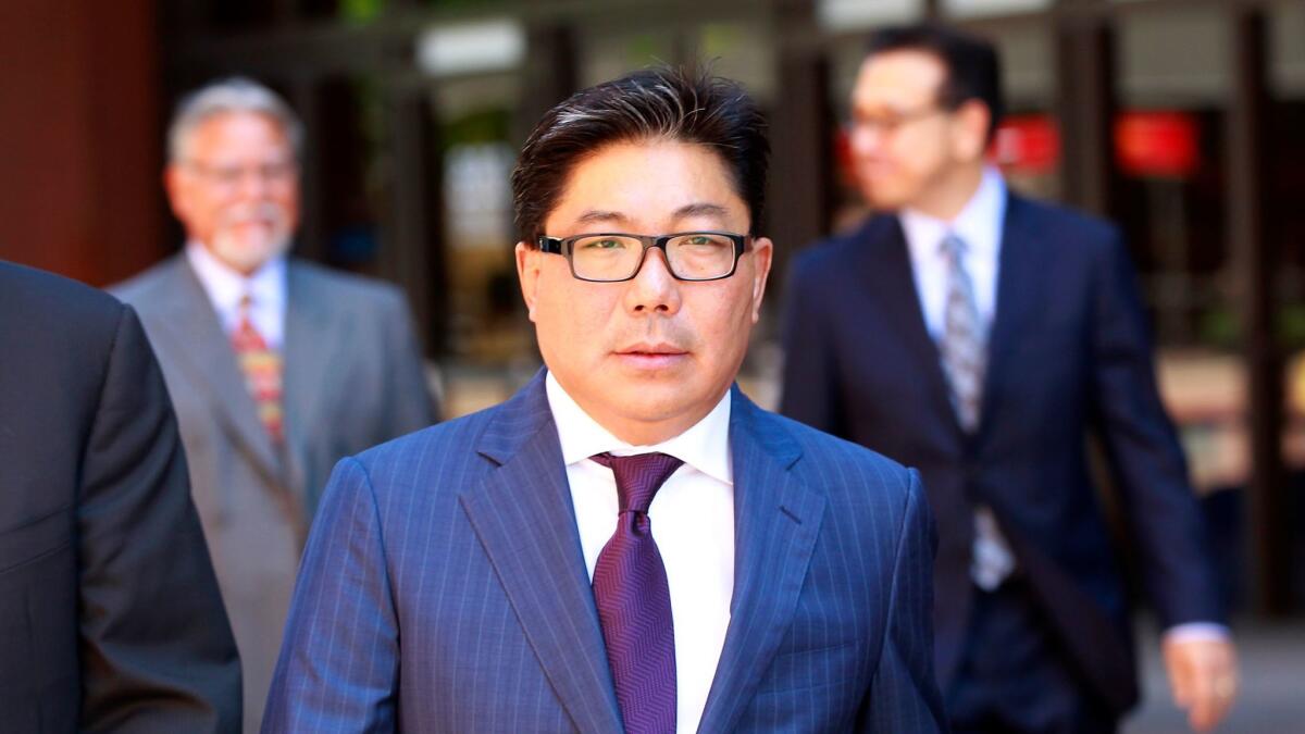 José Susumo Azano Matsura walks out of federal court after an August 2014 hearing.
