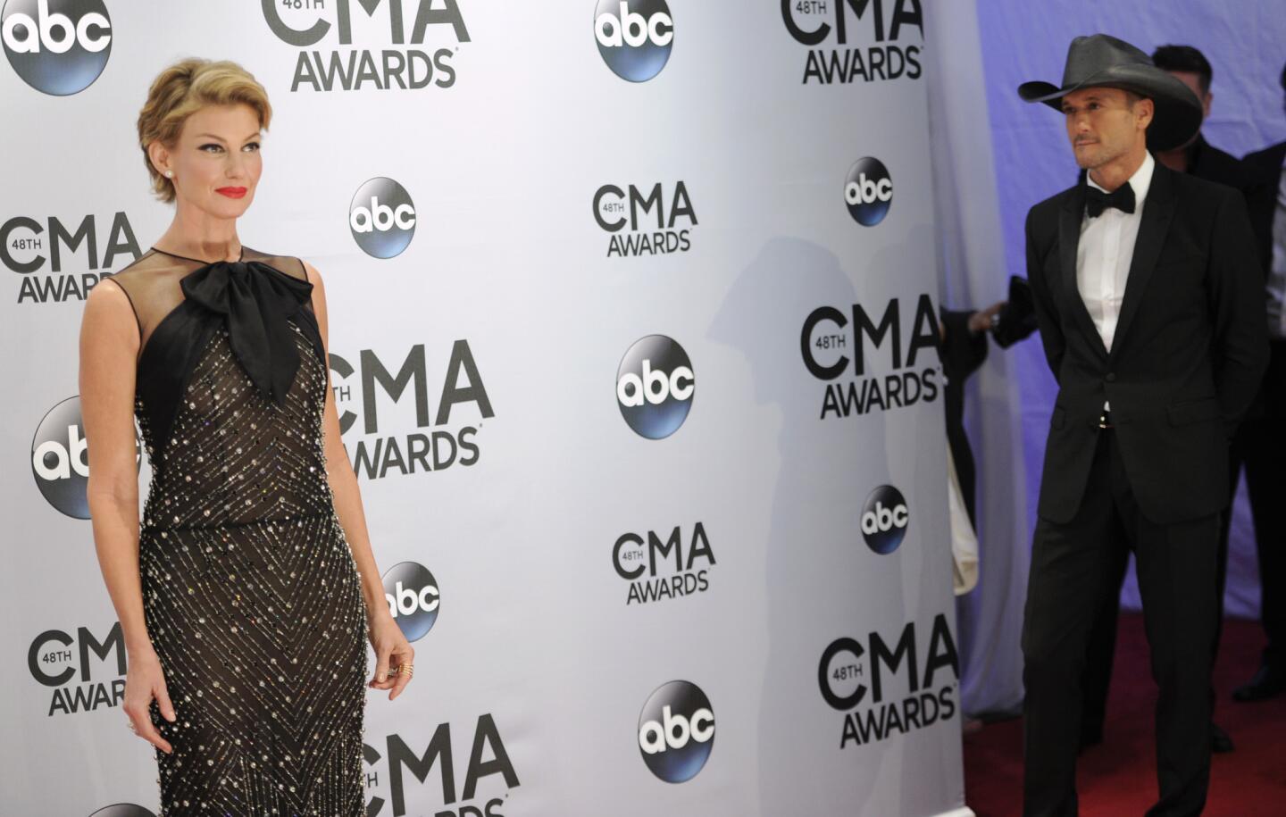 Faith Hill and Tim McGraw arrive at the 48th CMA Awards at the Bridgestone Arena in Nashville, Tenn.