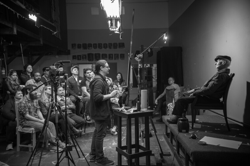 Artist David Kassan interviews and sketches Holocaust survivor Joshua Kaufman