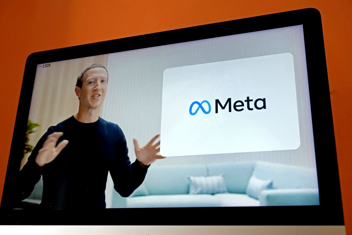 Facebook Chief Executive Mark Zuckerberg is shown on the screen of a device. 