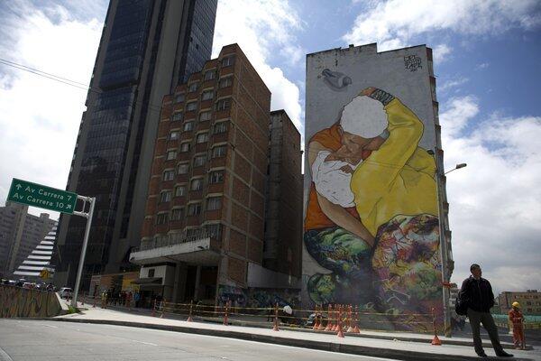 Building-size graffiti in Bogota, Columbia, approach fine art quality. Such work was once considered vandalism but is gaining space and respect in Bogota.