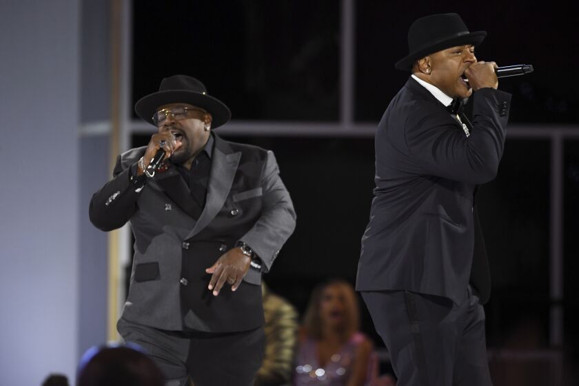 Cedric The Entertainer, left, and LL Cool J perform on stage at the 73rd Emmy Awards on Sunday, Sept. 19, 2021 at the Event Deck at L.A. LIVE in Los Angeles. (Photo by Phil McCarten/Invision for the Television Academy/AP Images)