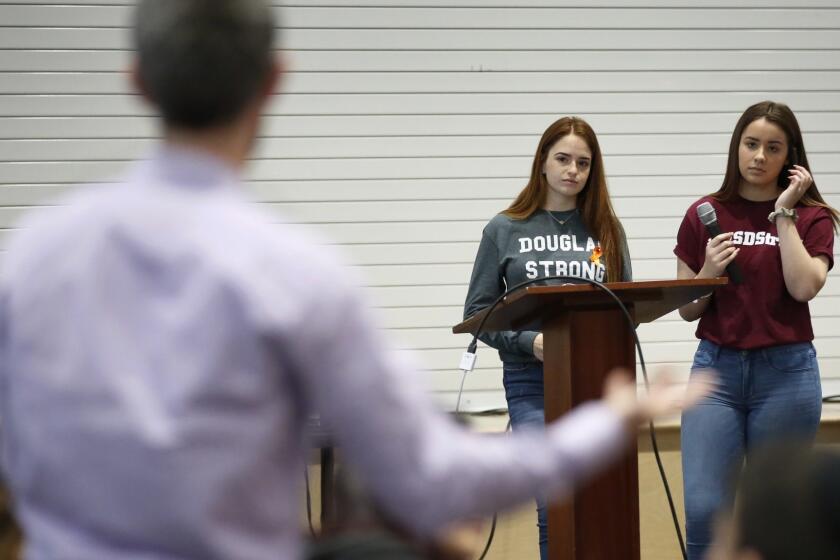 LOS ANGELES, CA - MARCH 23, 2018 - Marjory Stoneman Douglas High School students Hayley Licata, left, and Mia Freeman, right, speak to students at Shalhevet High School in Los Angeles for a âSafe Schoolsâ public discussion which included L.A. Unified Board of Education Vice President Nick Melvoin Friday, March 23, 2018. Hayley Licata and Mia Freeman have traveled to Los Angeles to share their stories with students around the city and attend the âMarch for Our Livesâ event on Saturday, March 24. (Al Seib / Los Angeles Times)